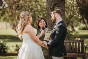 Gledswood Wedding Photo - celebrant announces the couple as husband and wife