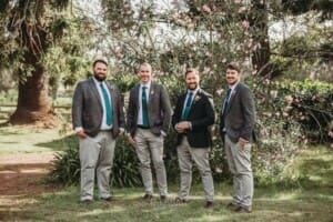 Gledswood Wedding Photo - the groom stands with his groomsmen