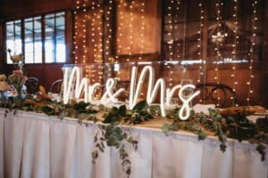 Gledswood Wedding Photo - Reception signage details on the bridal table