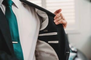 Gledswood Wedding Photo - Grooms initials embroidered on the inside of his suit jacket