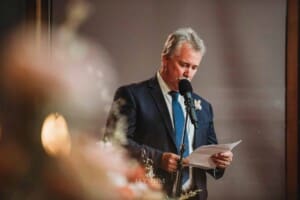 Gledswood Wedding Photo - groom's father makes his speech during the reception