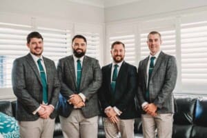 Gledswood Wedding Photo - Groom stands with his groomsmen