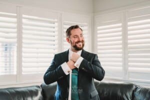 Gledswood Wedding Photo - Groom adjusts his tie