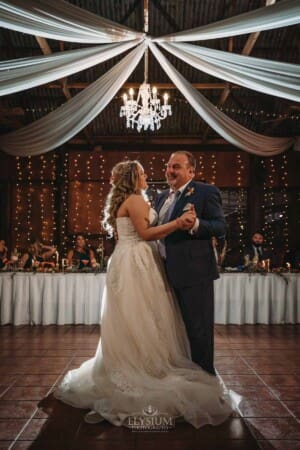 Gledswood Wedding Photo - the bride dances with her father during the reception