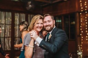 Gledswood Wedding Photo - the groom dances with his mum at the reception