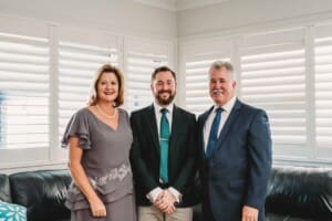 Gledswood Wedding Photo - Groom stands between his parents