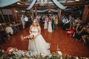 Gledswood Wedding Photo - the bride gets ready to throw her bouquet