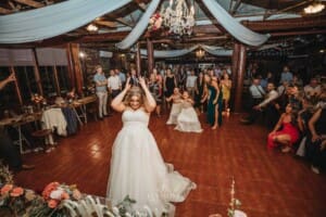 Gledswood Wedding Photo - the bride throws her bouquet