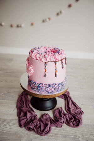 Cake Smash Session - a baby girl's pink birthday cake