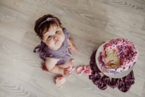 Cake Smash Session - baby girl smashes her first birthday cake