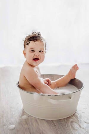 Cake Smash Session - baby girl enjoys a bubble bath after her cake smash