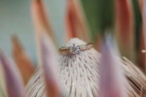 Burnham Grove Wedding - brides engagement ring sits in her bouquet