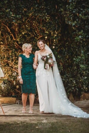 Burnham Grove Wedding - bride's mother walks down the aisle