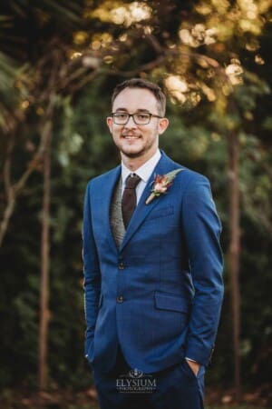 Burnham Grove Wedding - groom portrait in the Palm Grove
