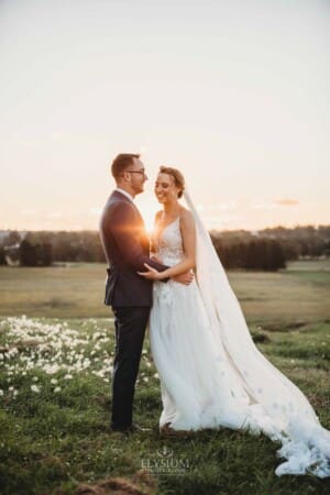 Burnham Grove Wedding - bride and groom share a giggle at sunset