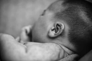 Newborn baby details, tiny hairs on the ear