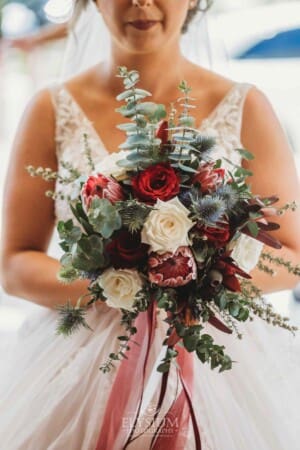 Gledswood Wedding - the bride holding her bouquet of Australian native flowers