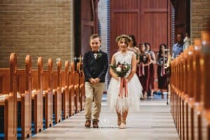 Gledswood Wedding - flower girl and ringbearer walking down the aisle at the ceremony