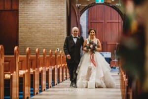 Gledswood Wedding - the bride and her father walking down the aisle at the ceremony