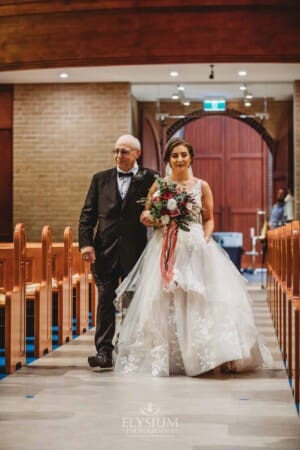 Gledswood Wedding - the bride and her father walking down the aisle at the ceremony