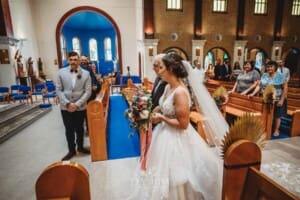Gledswood Wedding - the bride and her father walking down the aisle at the ceremony