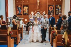 Gledswood Wedding - the bride and groom walk back down the aisle after the ceremony