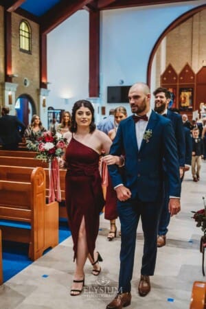 Gledswood Wedding - the bridal party walk back down the aisle after the ceremony