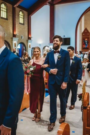 Gledswood Wedding - the bridal party walk back down the aisle after the ceremony