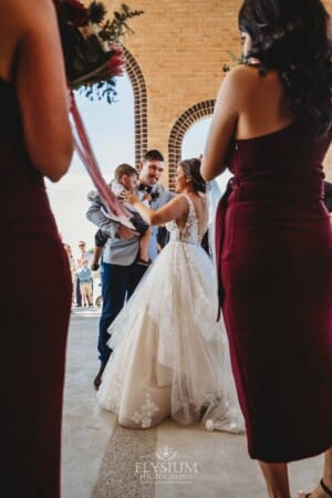 Gledswood Wedding - the bride and groom exit the church to Turkish drummers