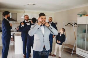 Gledswood Wedding - the Groom adjusts his tie