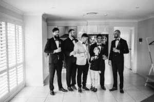 Gledswood Wedding - Groom makes a toast with his groomsmen during morning prep