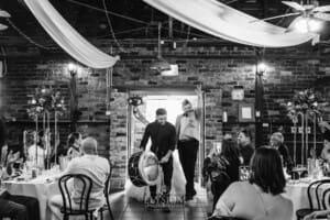 Gledswood Wedding - a bride and groom enter their reception to Turkish drummers