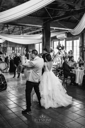 Gledswood Wedding - a bride and groom enter their reception to Turkish drummers