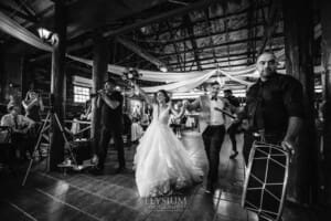 Gledswood Wedding - a bride and groom enter their reception to Turkish drummers