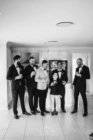 Gledswood Wedding - Groom makes a toast with his groomsmen during morning prep
