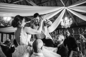 Gledswood Wedding - a bride and groom enter their reception to Turkish drummers