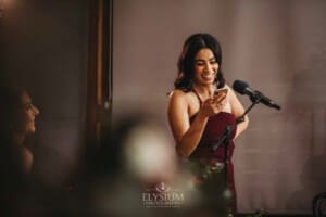 Gledswood Wedding - a bridesmaid makes her speech during the reception
