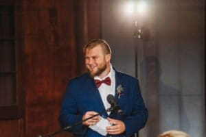 Gledswood Wedding - a groomsman makes his speech during the reception