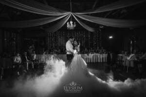 Gledswood Wedding - a bride and groom share their first dance at the reception