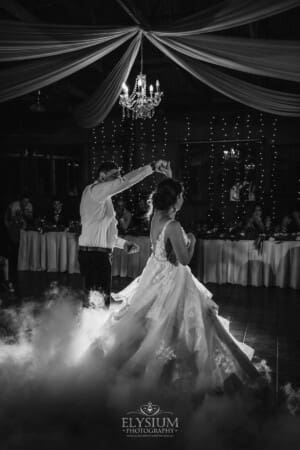 Gledswood Wedding - a bride and groom share their first dance at the reception