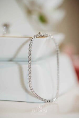 Gledswood Wedding - brides bracelet handing on a white dish