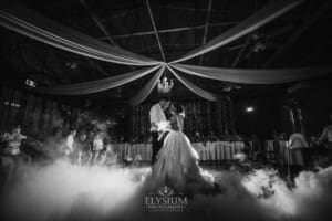 Gledswood Wedding - a bride and groom share their first dance at the reception