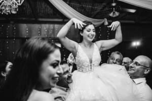 Gledswood Wedding - a bride dances with her guests at the reception