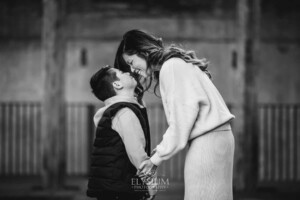 Family Photographer: a mother kisses her sons nose at Paddington Reservoir Gardens
