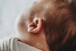 Details showing a baby girls tiny ear
