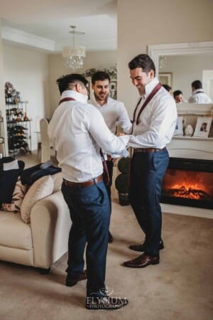 Sydney Wedding - groomsmen and the groom put on their ties