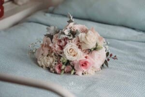 Sydney Wedding - a brides pastel bouquet sitting on a blue blanket
