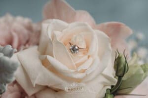 Sydney Wedding - a brides engagement ring sits in a bouquet rose