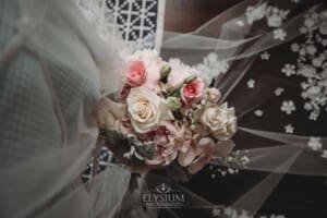 Sydney Wedding - a brides bouquet sits on her wedding veil