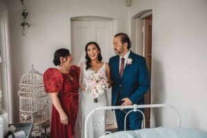 Sydney Wedding - a bride laughs with her parents before heading to the ceremony